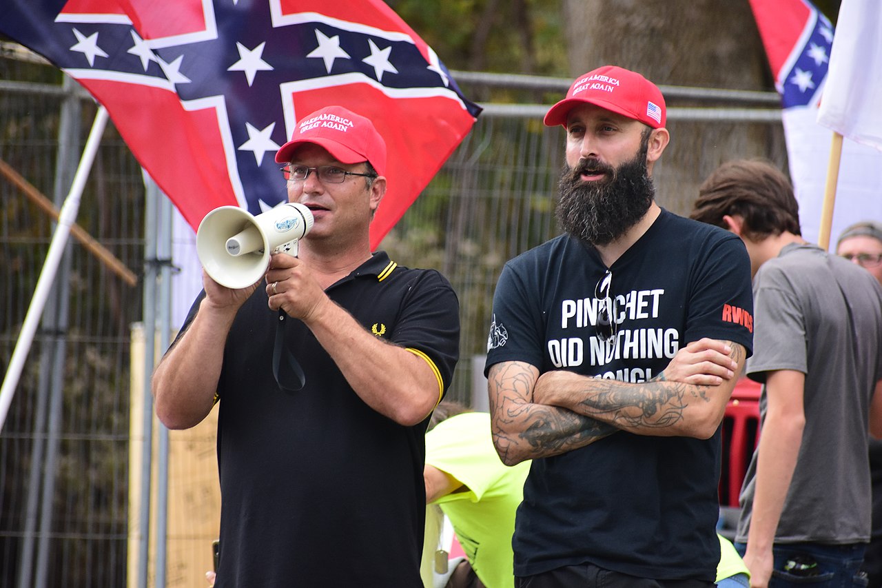 Proud Boys in MAGA hats at a neo-Confederate rally in 2019 / credit: Anthony Crider/Flickr